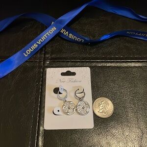 Fashion earrings. Beautiful statement earrings . Silver. Closet clear out.